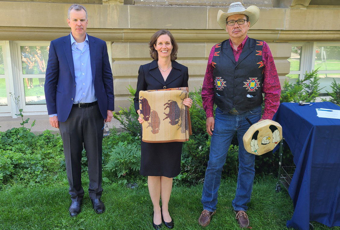 Alex Ross, CER EVP Law and General Counsel; Gitane De Silva, the new CEO of the CER; Elder Eldon Weasel Child from the Siksika Nation of the Blackfoot Confederacy. Ceremony held at Central Memorial Park in Calgary.